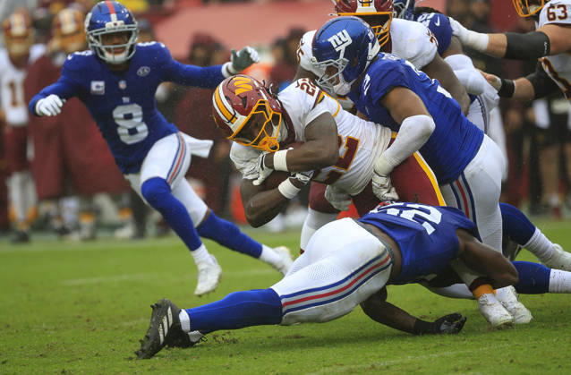 October 11, 2026: Washington Commanders RB 22 Jacory Croskey-Merritt is tackled by New York Giants CB 2 Deonte Banks during the Washington Commanders game against the New York Giants at Northwest Stadium in Landover, MD. CSM Landover United States of America - ZUMAc04_ 20261011_zma_c04_117 Copyright: xJustinxCooperx