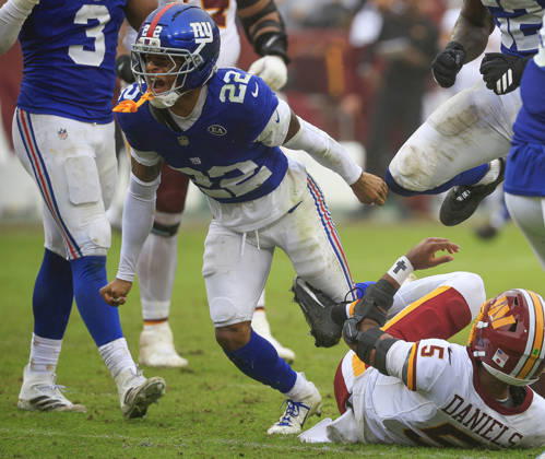 October 11, 2026: Washington Commanders QB 5 Jayden Daniels is sacked by New York Giants DB 22 Andru Phillips during the Washington Commanders game against the New York Giants at Northwest Stadium in Landover, MD. CSM Landover United States of America - ZUMAc04_ 20261011_zma_c04_115 Copyright: xJustinxCooperx