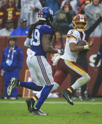 October 11, 2026: Washington Commanders QB 5 Jayden Daniels runs for a touchdown during the Washington Commanders game against the New York Giants at Northwest Stadium in Landover, MD. CSM NFL, American Football Herren, USA 2026: Washington Commanders Vs New York Giants OCT 11 - ZUMAc04_ 20261011_zma_c04_122 Copyright: xJustinxCooperx