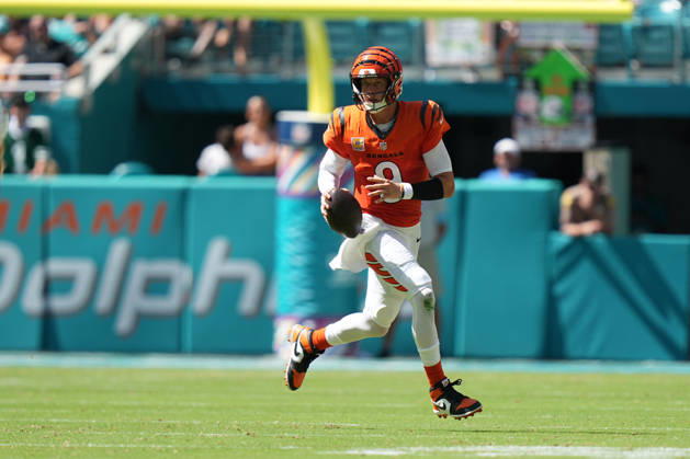 MIAMI GARDENS, FL - OCTOBER 11: Cincinnati Bengals quarterback Joe Burrow (9) scrambles with the ball during the NFL, American Football Herren, USA game between the Cincinnati Bengals and the Miami Dolphins on Sunday, October 11, 2026 at Hard Rcok Stadium in Miami Gardens, FL (Photo by Peter Joneleit Icon Sportswire) NFL: OCT 11 Bengals at Dolphins EDITORIAL USE ONLY Icon2601011027