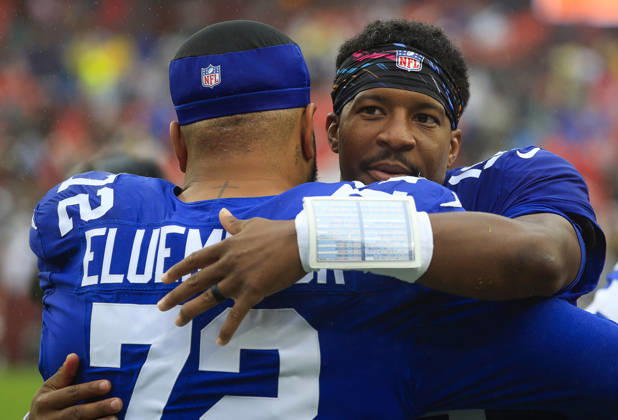 October 11, 2026: New York Giants QB 19 Jameis Winston hugs New York Giants G 72 Jermaine Eluemunor before the Washington Commanders game against the New York Giants at Northwest Stadium in Landover, MD. CSM NFL, American Football Herren, USA 2026: Washington Commanders Vs New York Giants OCT 11 - ZUMAc04_ 20261011_zma_c04_127 Copyright: xJustinxCooperx