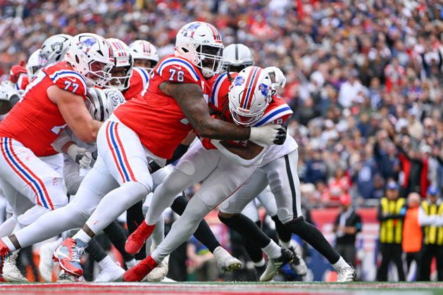 Oct 11, 2026; Foxborough, MA, USA; New England Patriots running back Rhamondre Stevenson (38) scores a touchdown against the Las Vegas Raiders with help from offensive tackle Morgan Moses (76) during the first half at Gillette Stadium. Mandatory Credit: -Cal Media Foxborough USA - ZUMAc04_ 20261011_zma_c04_134 Copyright: xEricxCanhax