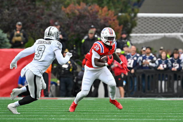 Oct 11, 2026; Foxborough, MA, USA; New England Patriots running back Rhamondre Stevenson (38) runs the ball against Las Vegas Raiders cornerback Taron Johnson (3) during the first half at Gillette Stadium. Mandatory Credit: -Cal Media Foxborough USA - ZUMAc04_ 20261011_zma_c04_136 Copyright: xEricxCanhax