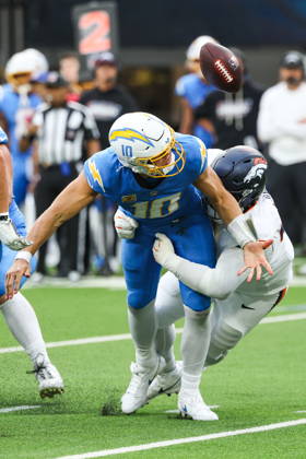 NFL, American Football Herren, USA - Los Angeles Chargers vs Denver Broncos Los Angeles Chargers quarterback Justin Herbert (10) recovers the football after fumbling during a sack by Denver Broncos defensive tackle D.J. Jones (93) in the second half of an NFL football game at SoFi Stadium in Inglewood, California, USA, 11 October 2026. INGLEWOOD CALIFORNIA UNITED STATES  Copyright: xCHRISxTORRESx