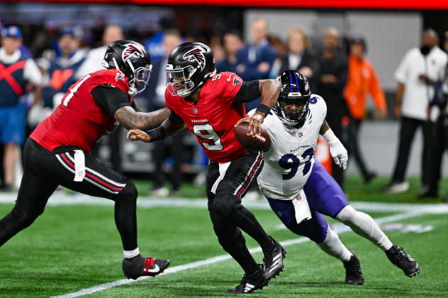 ATLANTA, GA - OCTOBER 11: Atlanta quarterback Michael Penix Jr. (9) scrambles while under pressure from Baltimore defensive tackle Nnamdi Madubuike (92) during the NFL, American Football Herren, USA game between the Baltimore Ravens and the Atlanta Falcons on October 11th, 2026 at Mercedes-Benz Stadium in Atlanta, GA. (Photo by Rich von Biberstein Icon Sportswire) NFL: OCT 11 Ravens at Falcons EDITORIAL USE ONLY Icon261011041