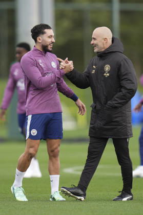 Manchester City Training, Champions League Manchester City manager Enzo Maresca greets Rayan Cherki of Manchester City during the training session ahead of UEFA Champions League matchday 2 vs Paris Saint-Germain, Manchester City at Joie Stadium, Etihad Campus, Manchester, England on 13 October 2026 Credit: Steve Flynn Every Second Media Editorial use only. All images are copyright Every Second Media Limited. No images may be reproduced without prior permission. Copyright: xIMAGO EveryxSecondxMediax ESM-2218-0108 StevexFlynnx xEveryxSecondxMediax