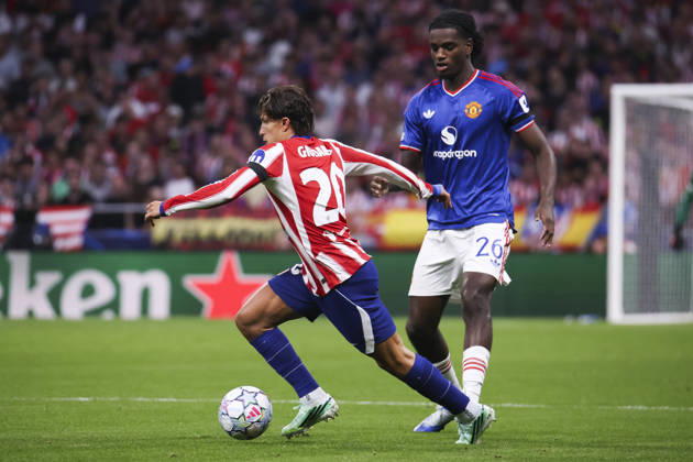 Atletico de Madrid v Manchester United, ManU - UEFA Champions League 2026 27 October 13, 2026, Riyadh Air Metropolitano Stadium, Madrid, Spain: Giuliano Simeone of Atletico de Madrid is defended by Ayden Heaven during UEFA Champions League 2026 27 football match between Atletico de Madrid and Manchester United at Riyadh Air Metropolitano Stadium on October 13, 2026, in Madrid, Spain. Madrid Riyadh Air Metropolitano Stadium Madrid Spain Copyright: xAlejandroxMatiasxAcostax