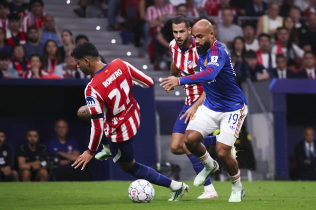 Atletico de Madrid v Manchester United, ManU - UEFA Champions League 2026 27 October 13, 2026, Riyadh Air Metropolitano Stadium, Madrid, Spain: Bryan Mbeumo of Manchester United is defended by David Hanko and Cristian Romero during UEFA Champions League 2026 27 football match between Atletico de Madrid and Manchester United at Riyadh Air Metropolitano Stadium on October 13, 2026, in Madrid, Spain. Madrid Riyadh Air Metropolitano Stadium Madrid Spain Copyright: xAlejandroxMatiasxAcostax