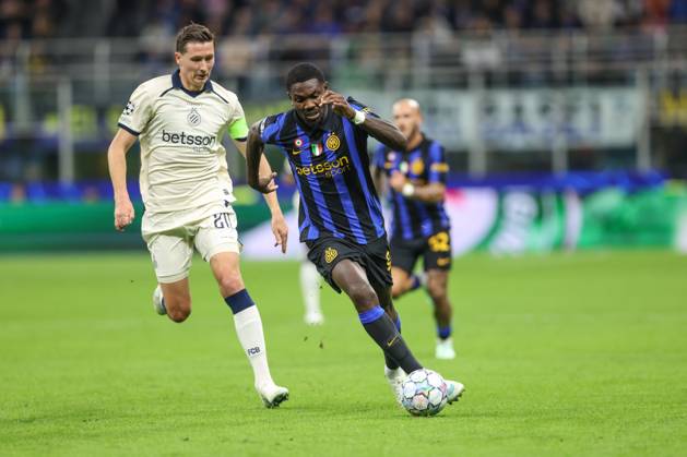 Club s Hans Vanaken and Inter s Marcus Thuram fight for the ball during a soccer game between Italian Inter Milan and Belgian Club Brugge KV, Tuesday 13 October 2026 in Milan, Italy, on day 2 of the UEFA Champions League league phase. BRUNOxFAHY  x189716993x