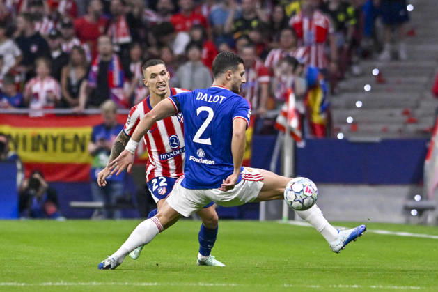 October 13, 2026, Madrid, Madrid, Spain: ALEJANDRO GRIMALDO of Club Atletico de Madrid pases the ball during the Champions League group stage Matchday 2 game between Atletico Madrid and Manchester United, ManU held on October 13, 2026, at the Riyadh Air Metropolitano in Madrid, Spain. ATLETICO DE MADRID Vs MANCHESTER UNITED Champions League Match, Season 26 27 (10.13.26)  - ZUMAc312 20261013_zsp_c312_017 Copyright: xOscarxManuelxSanchezx