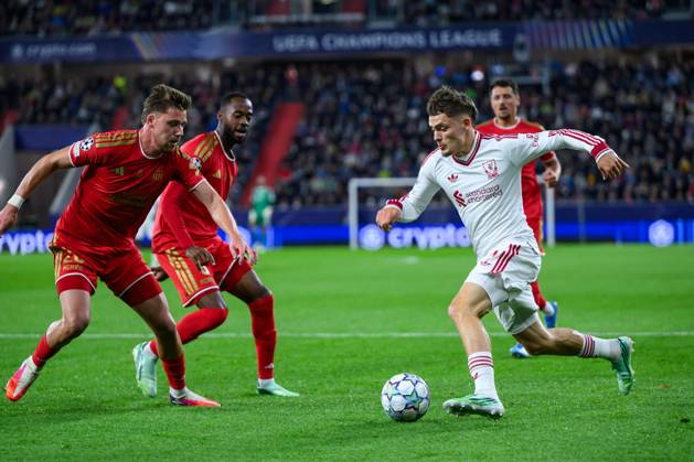 SOCCER - UEFA CL, LASK vs Liverpool LINZ,AUSTRIA,14.OCT.26 - SOCCER - UEFA Champions League, Linzer ASK vs Liverpool FC. Image shows Kasper Joergensen (LASK) and Florian Wirtz (Liverpool).  GEPAxpictures xChristianxMoser