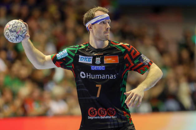 14.10.2026, xtgx, Handball Champions Legaue, SC Magdeburg - Industria Kielce emspor, v.l. Felix Claar (Magdeburg, 7) Verband Kopfverband verletzt Verletzung Magdeburg