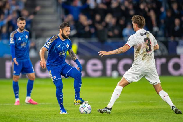 Tigran Barseghyan in a battle with Ramon Hendriks during UEFA Champions league match , SK Slovan Bratislava - VFB Stuttgart , 14. october 2026, Tehelne pole Stadium, Bratislava, Slovakia Copyright: xMICHALxFAJT,ZOSPORTU.SKx MAJ_0903
