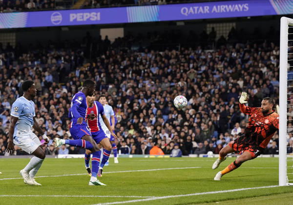 Manchester, England, 14th October 2026. Dembele Ousmane of Paris Saint-Germain scores their second goal during the Manchester City vs Paris Saint Germain UEFA Champions League match at the Etihad Stadium, Manchester. Picture credit should read: Andrew Yates Sportimage EDITORIAL USE ONLY. No use with unauthorised audio, video, data, fixture lists, club league logos or live services. Online in-match use limited to 120 images, no video emulation. No use in betting, games or single club league player publications. SPI_027_AY_Man_City_PSG SPI-5069-0027