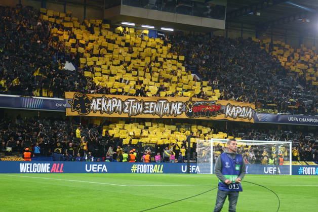 UEFA Champions League - Shakhtar Donetsk vs AEK Athens FC - Fans of AEK Athens FC react during the UEFA Champions League phase Matchday 2 soccer match between Shakhtar Donetsk vs AEK Athens FC in Stamford Bridge, London, UK, on 13 October 2026. IMAGO ONE INCH PRODUCTIONS LONDON UK Copyright: xONExINCHxPRODUCTIONSx 7122969