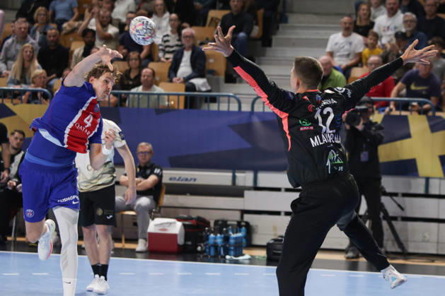 (261015) -- CELJE, Oct. 15, 2026 -- Bjarki Mar Elisson (L) of Paris Saint-Germain shoots the ball during the European Handball Federation (EHF) Champions League match between RK Celje Pivovarna Lasko and Paris Saint-Germain at Zlatorog Sports Hall in Celje, Slovenia, Oct.14, 2026. (Photo by Xinhua) (SP)SLOVENIA-CELJE-HANDBALL-EHF CHAMPIONS LEAGUE-RK CELJE PIVOVARNA LASKO VS PARIS SAINT-GERMAIN ZeljkoxStevanic 