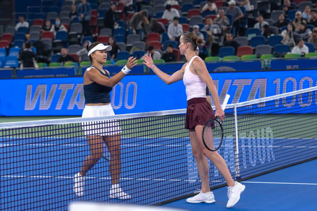 (261015) -- WUHAN, Oct. 15, 2026 -- Guo Hanyu (L) greets Elina Svitolina after the women s sinlges round of 16 match between Guo Hanyu of China and Elina Svitolina of Ukraine at the 2026 Wuhan Open tennis tournament in Wuhan, capital of central China s Hubei Province, Oct. 15, 2026. ) (SP)CHINA-WUHAN-TENNIS-WUHAN OPEN-WOMEN S SINGLES(CN) XiaoxYijiu 