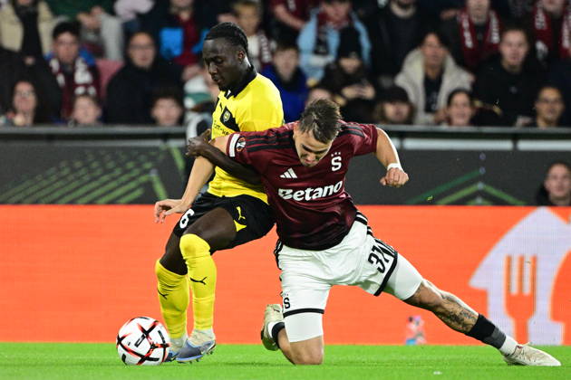 Football European League, 2nd round match Sparta Praha vs Lillestrom SK in Prague, Czech Republic, October 15, 2026. From left Yaw Paintsil of Lillestrom, Matej Jurasek of Sparta. (CTKxPhoto MichalxKamaryt) CTKPhotoP2026101507497  CTKPhotoP2026101507497