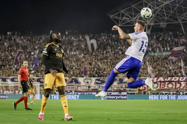 SPLIT - (lr) Tolu Arokodare of Ajax and Dario Maresic of Hajduk Split during the Conference League match between Hajduk Split and Ajax at Stadion Poljud on 15 October 2026 in Split, Croatia. SONNY LENSEN ANP xVIxANPxSportx xxANPxIVx 572540154 originalFilename: 572540154.jpg