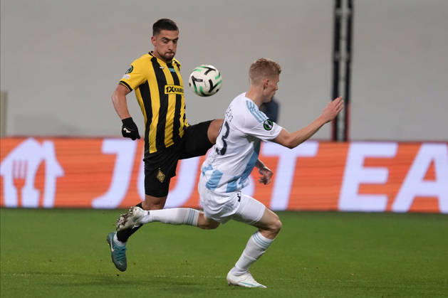 Maksims Tonisevs of Riga FC and Edmilson of Kairat compete for the ball during a UEFA Conference League soccer match between Latvia™s Riga FC and Kazakhstan™s Kairat Almaty at Skonto Stadium in Riga, Latvia, Thursday, Oct. 15, 2026. Riga Latvia Copyright: xRomanxKoksarovx RKV02088.JPG