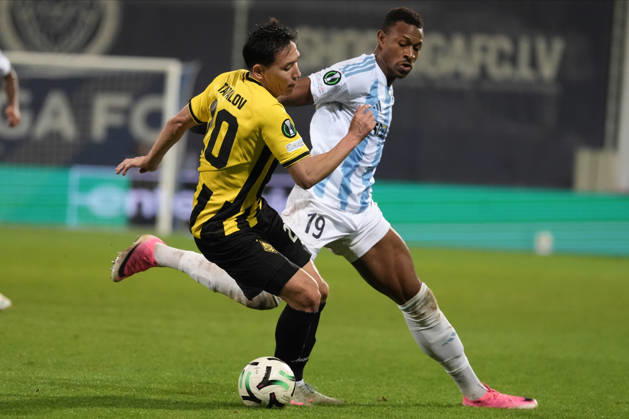 Erkin Tapalov of Kairat and Muhammed Badamosi of Riga FC compete for the ball during a UEFA Conference League soccer match between Latvia™s Riga FC and Kazakhstan™s Kairat Almaty at Skonto Stadium in Riga, Latvia, Thursday, Oct. 15, 2026. Riga Latvia Copyright: xRomanxKoksarovx RKV02368.JPG