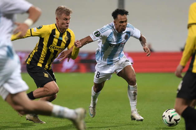 Iago Siqueira of Riga FC and Jaakko Oksanen of Kairat compete for the ball during a UEFA Conference League soccer match between Latvia™s Riga FC and Kazakhstan™s Kairat Almaty at Skonto Stadium in Riga, Latvia, Thursday, Oct. 15, 2026. Riga Latvia Copyright: xRomanxKoksarovx RKV02500.JPG