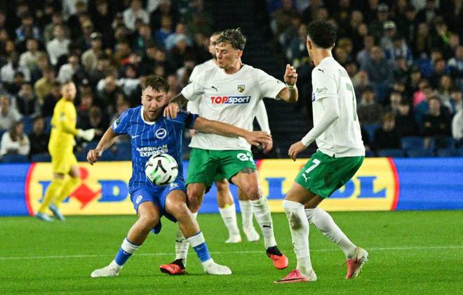 Jack Hinshelwood of Brighton on the left battles for the ball during the UEFA Conference League match between Brighton and Hove Albion and Kuano Zalgiris at the American Express Stadium , Brighton , UK - 15th October 2026 Brighton & Hove Albion vs Kuano Zalgiris UEFA Conference League Football, Amex Stadium, Sussex, United Kingdom - 15 Oct 2026Brighton Amex Stadium Sussex United Kingdom Editorial use only. No merchandising. For Football images FA and Premier League restrictions apply inc. no internet mobile usage without FAPL license - for details contact Football Dataco  Copyright: xSimonxDack TPI Shutterstockx 17218395s
