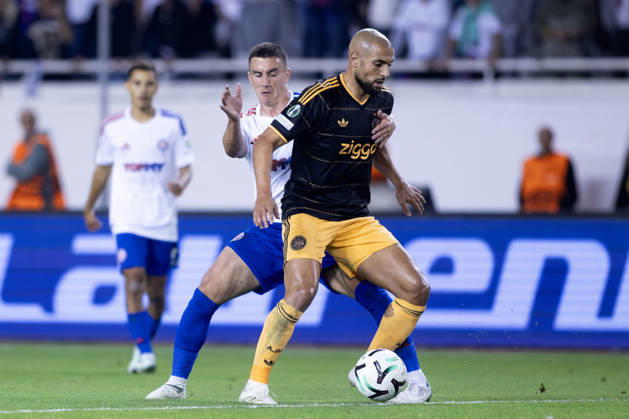 October 15, 2026, Split, Dalmatia, Croatia: Sofyan Amrabat (AFC Ajax) 4 and Michele Sego (HNK Hajduk) in action during he UEFA Conference League match between HNK Hajduk Split (CRO) and AFC Ajax Amsterdam (NL) at Poljud Stadium. Split Croatia - ZUMAp210 20261015_zsp_p210_049 Copyright: xMajaxPrgometx