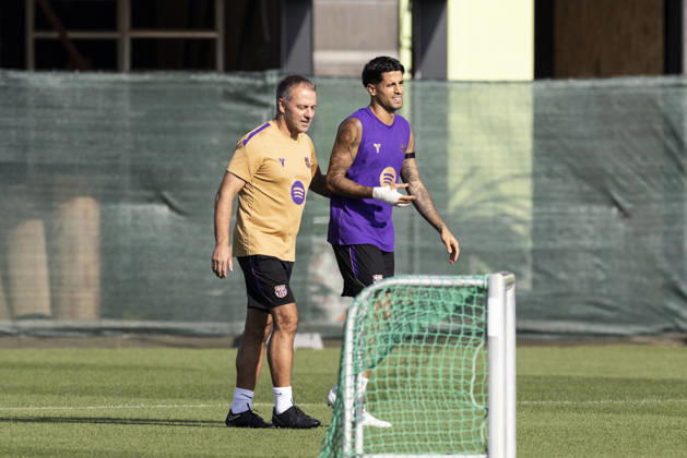 October 16, 2026, Sant Joan Despi, Barcelona, Spain: Hansi Flick, head coach and Joao Cancelo during the training day of FC Barcelona, Barca ahead the Spanish League, Laliga EA Sports, football match against Real Betis at Ciudad Esportiva Joan Gamper on October 16, 2026 in Sant Joan Despi, Barcelona, Spain. FC Barcelona Training And press conference, PK, Pressekonferenz - LaLiga EA Sports  - ZUMAa181 20261016_zaa_a181_035 Copyright: xJavierxBorregox