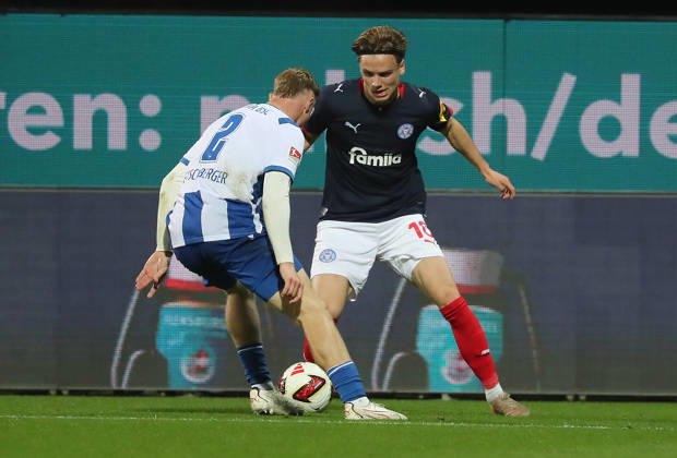 Julian Eitschberger (Hertha BSC Berlin), Jonas Therkelsen (Holstein Kiel) Fussball, Herren, Saison 2026 2027, 2.BL, Holstein Stadion, Holstein Kiel gegen Hertha BSC Berlin DFL REGULATIONS PROHIBIT ANY USE OF PHOTOGRAPHS AS IMAGE SEQUENCES AND OR QUASI-VIDEO.