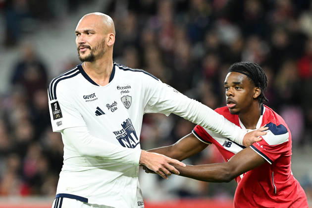 261017 Lille OSC vs Brest Ludovic Ajorque (19) of Brest and Nathan Ngoy (3) of Lille pictured during the French Mc Donalds Ligue 1 season 2026 - 2027 matchday 7 game between Lille OSC and Stade Brest on October 17 , 2026 in Lille, France. (Photo by Jill Delsaux Isosport) Lille France  Copyright: xJillxDelsauxx DSC_2394