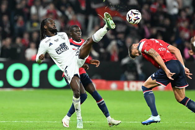 261017 Lille OSC vs Brest Bradly Locko (2) of Brest, Soriba Diaoune (35) of Lille and Olivier Giroud (9) of Lille pictured during the French Mc Donalds Ligue 1 season 2026 - 2027 matchday 7 game between Lille OSC and Stade Brest on October 17 , 2026 in Lille, France. (Photo by Jill Delsaux Isosport) Lille France  Copyright: xJillxDelsauxx DSC_2931