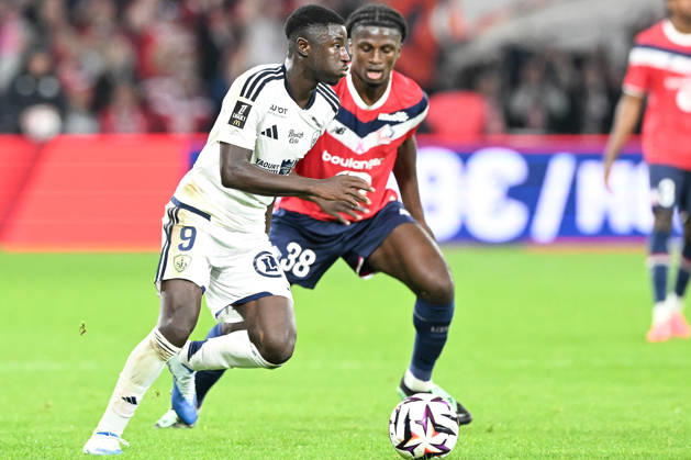 261017 Lille OSC vs Brest Pathe Mboup (9) of Brest and Maxima Goffi (38) of Lille pictured during the French Mc Donalds Ligue 1 season 2026 - 2027 matchday 7 game between Lille OSC and Stade Brest on October 17 , 2026 in Lille, France. (Photo by Jill Delsaux Isosport) Lille France  Copyright: xJillxDelsauxx DSC_2940