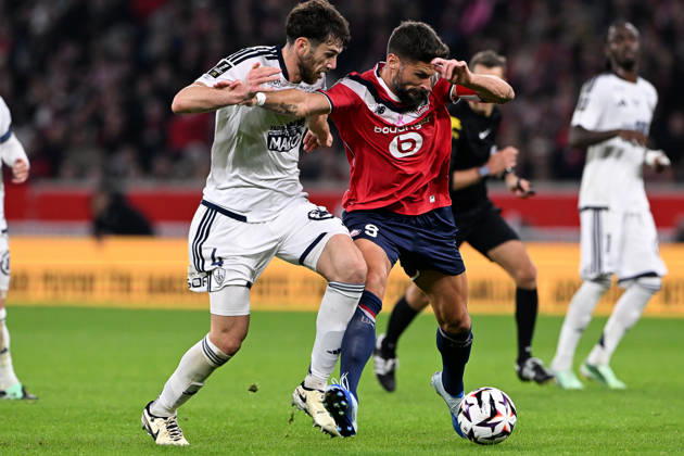 261017 Lille OSC vs Brest Gautier Lloris (4) of Brest and Olivier Giroud (9) of Lille pictured during the French Mc Donalds Ligue 1 season 2026 - 2027 matchday 7 game between Lille OSC and Stade Brest on October 17 , 2026 in Lille, France. (Photo by Jill Delsaux Isosport) Lille France  Copyright: xJillxDelsauxx DSC_2990
