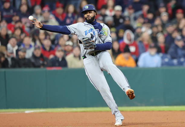 Tampa Bay Rays third baseman Junior Caminero (13) throws out Cleveland Guardians Jose Ramirez in the fourth inning during game four of the MLB, Baseball Herren, USA American League Championship Series at Progressive Field in Cleveland, Ohio, on Saturday, October 17, 2026.  CLE20261017717 AARONxJOSEFCZYK