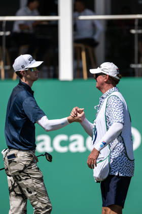 October 18, 2026, Macau, Macao Sar, China: Charles PORTER from the USA takes the tied lead on -14 Par with a stunning -9 Par final round. PORTER is congratulated by his caddy. Macau Open Golf 2026 Final Round. Macau Open Golf 2026 Final Round  - ZUMAr144 20261018_zap_r144_058 Copyright: xJaynexRussellx
