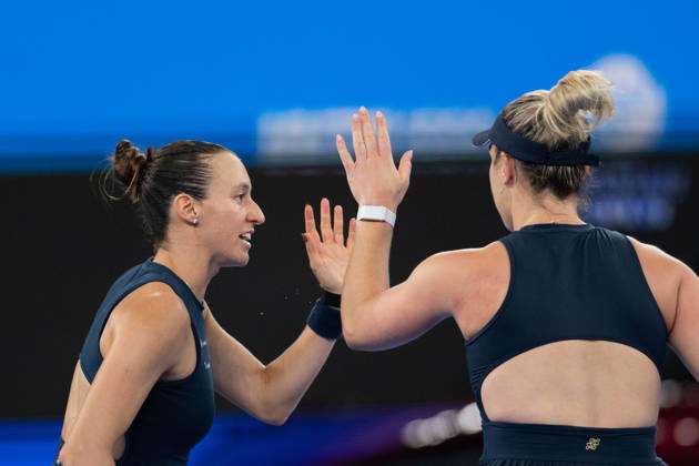 (261018) -- WUHAN, Oct. 18, 2026 -- Gabriela Dabrowski Luisa Stefani (L) celebrate during the women s doubles final match between Gabriela Dabrowski of Canada Luisa Stefani of Brazil and Storm Hunter of Australia Katerina Siniakova of the Czech Republic at the 2026 Wuhan Open tennis tournament in Wuhan, capital of central China s Hubei Province, Oct. 18, 2026. ) (SP)CHINA-WUHAN-TENNIS-WUHAN OPEN-WOMEN S DOUBLES (CN) DuxZixuan 