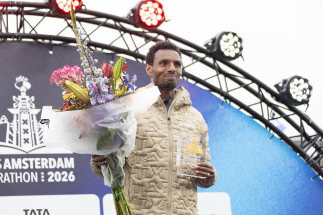 (261018) -- AMSTERDAM, Oct. 18, 2026 -- Lemi Berhanu of Ethiopia displays his trophy on the awarding podium after winning the men s race of the Amsterdam Marathon in Amsterdam, the Netherlands, Oct. 18, 2026. (Photo by Xinhua) (SP)THE NETHERLANDS-AMSTERDAM-MARATHON SylviaxLederer 
