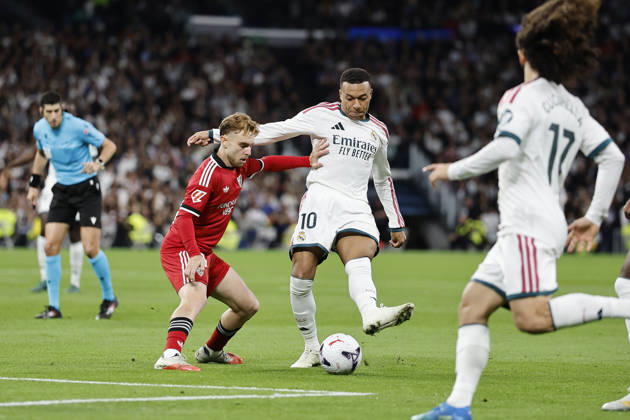RECORD DATE NOT STATED Kylian Mbappe (Real Madrid CF) controls the ball under pressure during the LaLiga EA Sports match between Real Madrid CF and Sevilla FC at Estadio Santiago Bernabéu on October 18, 2026 in Madrid, Spain. (Photo by Manu Reino DeFodi Images) -