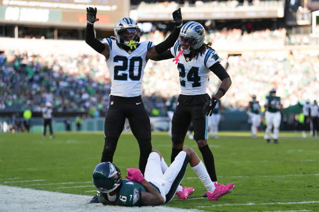 PHILADELPHIA, PA - OCTOBER 18: Carolina Panthers safety Zakee Wheatley (20) reacts with cornerback Will Lee III (24) after an incompletion against Philadelphia Eagles wide receiver DeVonta Smith (6) in the second half during the game between the Carolina Panthers and Philadelphia Eagles on October 18, 2026 at Lincoln Financial Field in Philadelphia, PA. (Photo by Kyle Ross Icon Sportswire) NFL, American Football Herren, USA OCT 18 Panthers at Eagles EDITORIAL USE ONLY Icon26101817