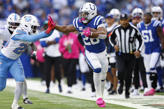 INDIANAPOLIS, IN - OCTOBER 18: Indianapolis Colts running back Jonathan Taylor (28) with the stiff arm to Tennessee Titans safety Tony Adams (29) in the second half of play during and NFL, American Football Herren, USA game between the Tennessee Titans and the Indianapolis Colts on October 18, 2026 at Lucas Oil Stadium at Indianapolis, IN. (Photo by Jeffrey Brown Icon Sportswire) NFL: OCT 18 Titans at Colts EDITORIAL USE ONLY Icon101826051