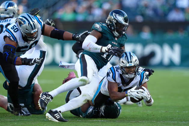 PHILADELPHIA, PA - OCTOBER 18: Carolina Panthers running back Chuba Hubbard (30) dives on a carry against Philadelphia Eagles linebacker Arnold Ebiketie (17) in the second half during the game between the Carolina Panthers and Philadelphia Eagles on October 18, 2026 at Lincoln Financial Field in Philadelphia, PA. (Photo by Kyle Ross Icon Sportswire) NFL, American Football Herren, USA OCT 18 Panthers at Eagles EDITORIAL USE ONLY Icon26101846