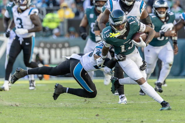 Philadelphia Eagles wide receiver Dontayvion Wicks (13) is tackled by Carolina Panthers safety Zakee Wheatley (20) at the 47 yard line during the fourth quarter of NFL, American Football Herren, USA action at Lincoln Financial Field in Philadelphia, Pennsylvania on Sunday, October 18, 2016. The Panthers won 25-14.  PHI20261018025 LAURENCExKESTERSON