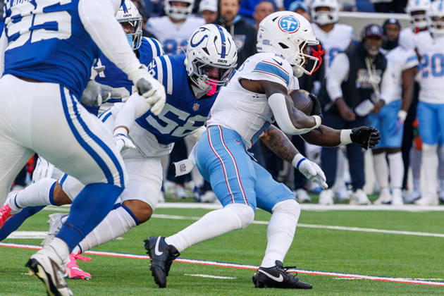 October 18, 2026, Indianapolis, Indiana, U.S: Tennessee Titans running back Tyjae Spears (2) carries the ball and is tackled by Indianapolis Colts linebacker Austin Ajiake (58) during the game between the Tennessee Titans and the Indianapolis Colts at Lucas Oil Stadium, Indianapolis, Indiana. NFL, American Football Herren, USA 2026 Titans 26-20 Colts  - ZUMAs304 20261018_zaf_s304_011 Copyright: xScottxStuartx