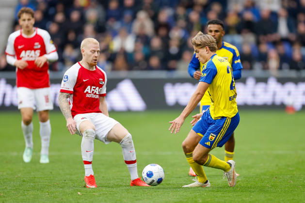 LEEUWARDEN, NETHERLANDS - OCTOBER 18: Mexx Meerdink of AZ, Wiebe Kooistra of SC Cambuur during the Eredivisie 2026 27 match between SC Cambuur and AZ Alkmaar at Kooi Stadium on October 18, 2026 in Leeuwarden, Netherlands.  Copyright: xDijksxMedia MBxMediax