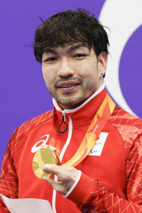 Aichi-Nagoya Asian Para Games: Swimming Six-time Paralympian swimmer Takayuki Suzuki poses after winning the Aichi-Nagoya Asian Para Games men s 50-meter freestyle S4 gold in Nagoya, central Japan, on Oct. 19, 2026.  A14AA0005631271P
