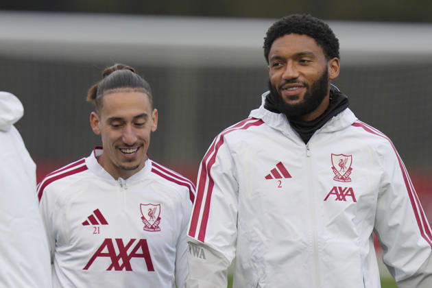 Liverpool Training, Champions League Joe Gomez of Liverpool FC jokes with Konstantinos Tsimikas of Liverpool FC as they warm up before the Liverpool Training Session ahead of the UEFA Champions League Matchday 3 v Villarreal CF, AXA Training Centre, Liverpool, United Kingdom on 19 October 2026 Credit: Steve Flynn Every Second Media Editorial use only. All images are copyright Every Second Media Limited. No images may be reproduced without prior permission. Copyright: xIMAGO EveryxSecondxMediax ESM-2242-0028 StevexFlynnx xEveryxSecondxMediax