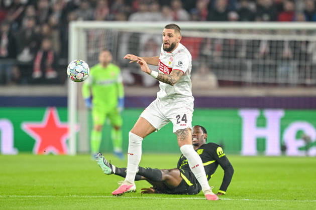 Jeff Chabot (VfB Stuttgart) and Jonathan David (Atletico Madrid) battle for the ball during the UEFA Champions League 2026 2027 match between Stuttgart and Atlético de Madrid at Arena Stuttgart on October 20, 2026 in Stuttgart, Germany. (Photo by Harry Langer DeFodi Images) -