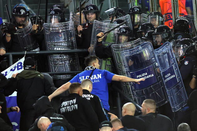 SOCCER - UEFA Champions League - AS Roma vs. Slovan Bratislava Photo by IPA ABACAPRESS.COM89965692 - Rome, Italy - October 20, 2026: Clashes between Bratislava fans and police during the 2026-2027 UEFA Champions League soccer match between AS Roma and SK Slovan Bratislava at the Olympic Stadium in Rome. Roma Italy  Copyright: xIPAxSport ABACAx