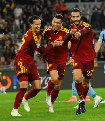 (261021) -- ROME, Oct. 21, 2026 -- Roma s Mario Hermoso (R) celebrates his goal with teammates during the UEFA Champions League football match between Roma and Slovan Bratislava in Rome, Italy, Oct. 20, 2026. (Photo by Xinhua) (SP)ITALY-ROME-FOOTBALL-UEFA CHAMPIONS LEAGUE-ROMA VS SLOVAN BRATISLAVA AlbertoxLingria 